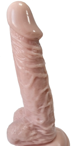 Рельефный фаллос с ярко выраженной головкой на присоске фото 2