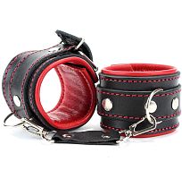 Черные наручники из толстой натуральной кожи с кожаным красным подкладом