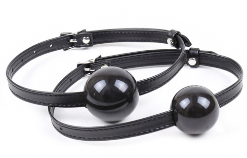 Силиконовый кляп-шар черного цвета на тонком ремешке фото 8