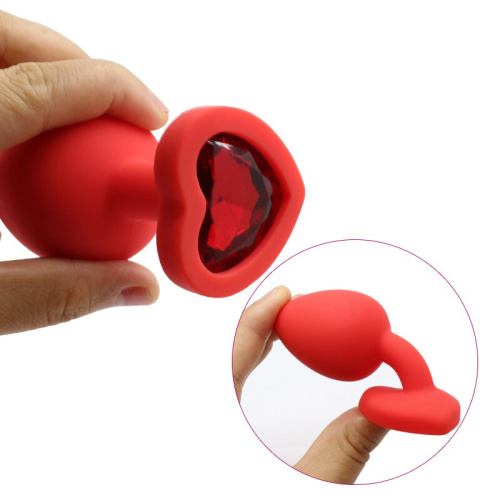 Красная силиконовая пробка с кристаллом в форме сердца M прозрачная фото 2