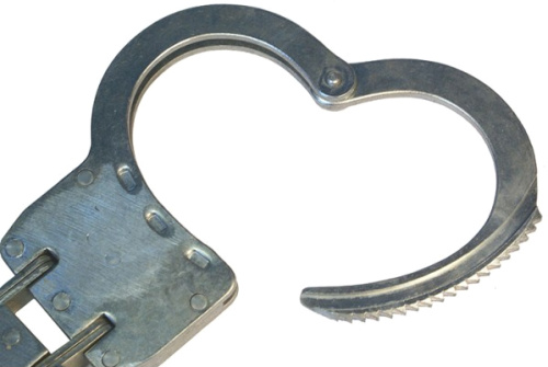 Настоящие милицейские наручники с жестким креплением фото 2