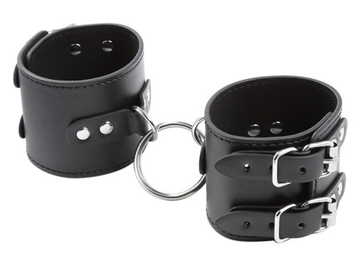 Широкие черные поножи с кольцом фото 5