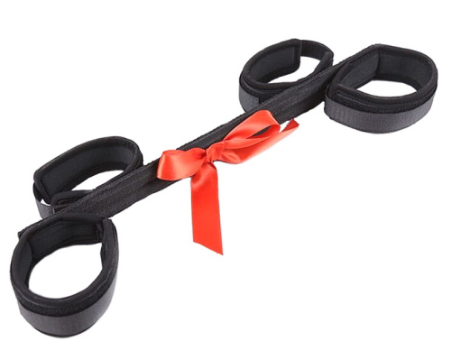 Бондажная распорка для рук и ног декорированная бантиком фото 2