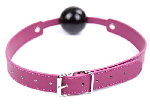 Силиконовый черный кляп на фиолетовом ремне фото 2