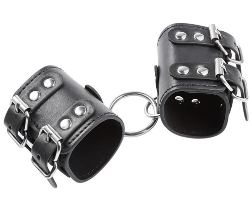 Широкие черные поножи с кольцом фото 6