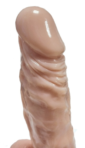 Рельефный фаллос с ярко выраженной головкой на присоске 21 см фото 3